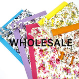 Wholesale Floral and solid colors faux leather sheets.