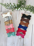 Set of 12 faux leather bows. Baby headband. Baby bows. Baby hair accessories