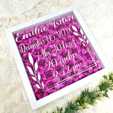 Baby birth stats Shadow box filled with rolled roses.