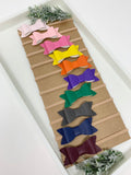 Set of 10 faux leather baby bows. Headbands