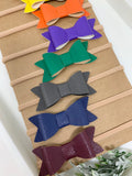 Set of 10 faux leather baby bows. Headbands