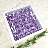 Baby birth stats Shadow box filled with rolled roses.