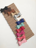 Set of 12 faux leather bows. Baby headband. Baby bows. Baby hair accessories