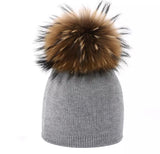 Knitted baby hat with Fur Pom Pom
